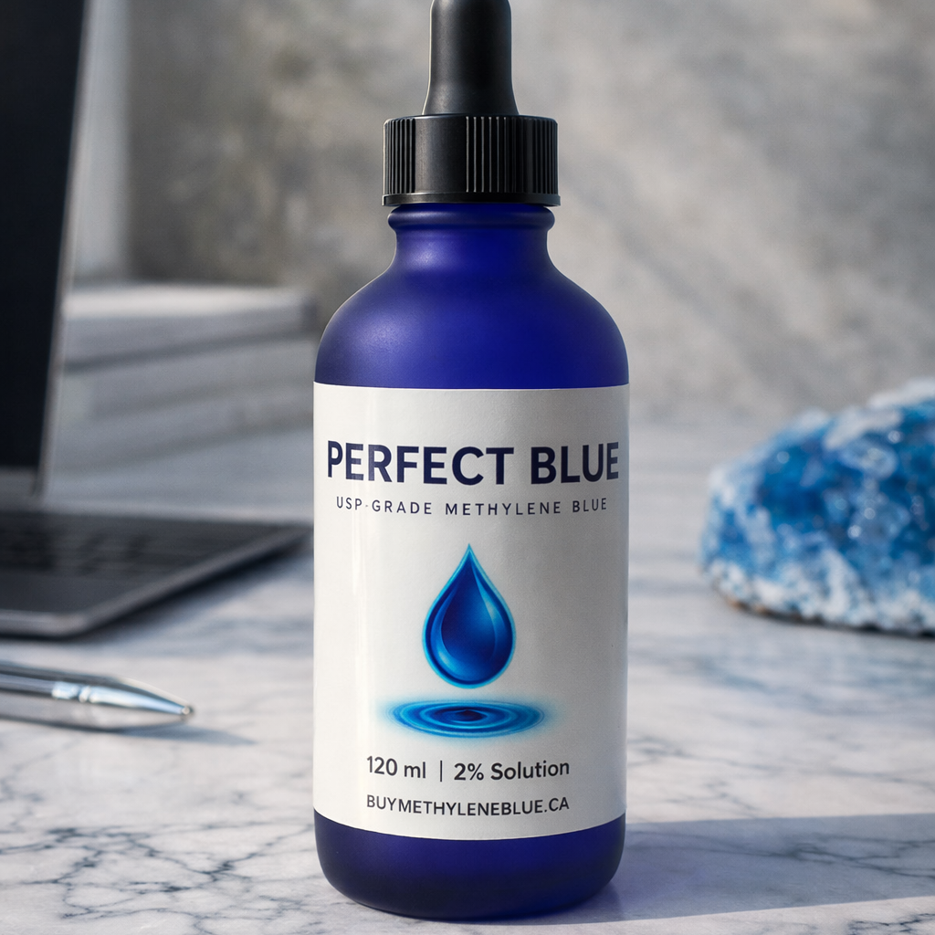 Bottle of Perfect Blue solution on a marble surface with a blurred background